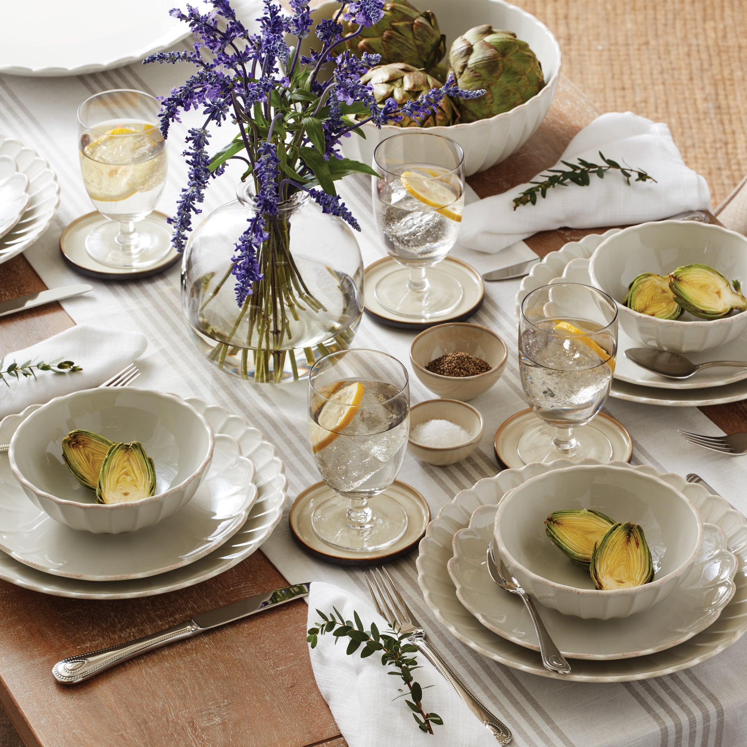 Decorative plates arranged on a softly styled table